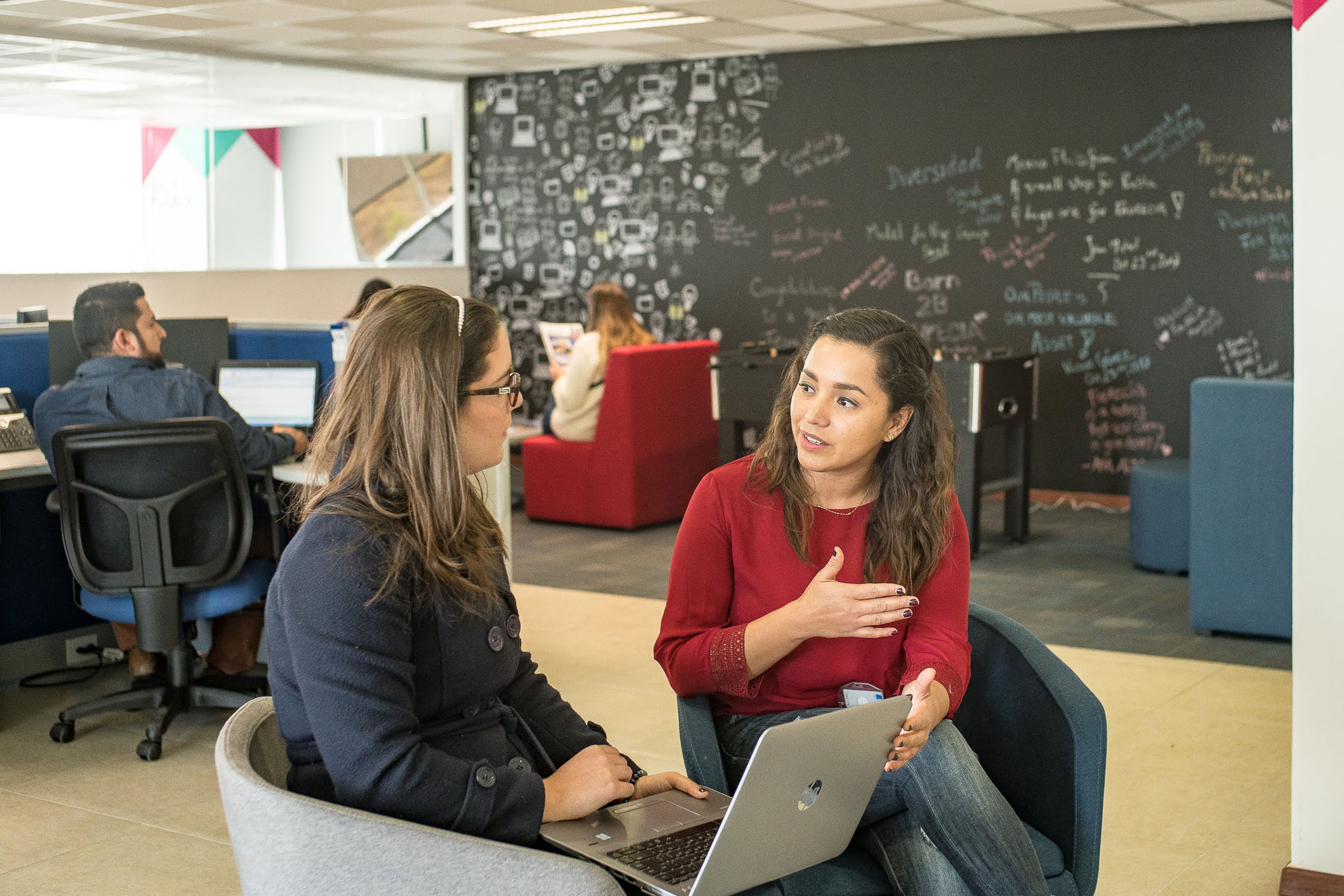 Two women working